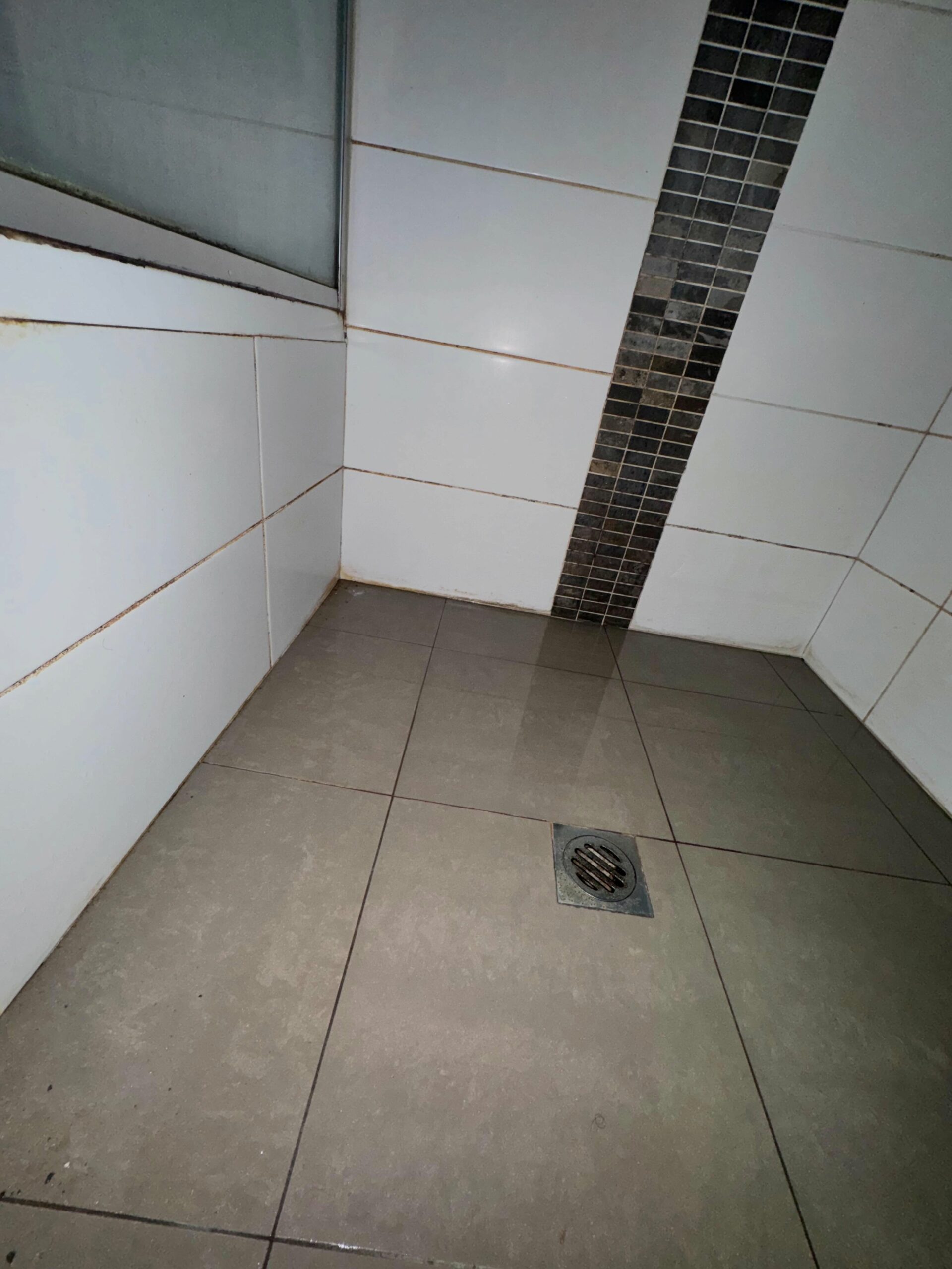 Second before photo shower regrouting Ocean Reef